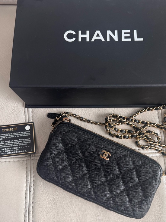 CHANEL Handbags - CHANEL Black Quilted Leather Clutch/Wallet on Chain with Gold-Tone Hardware